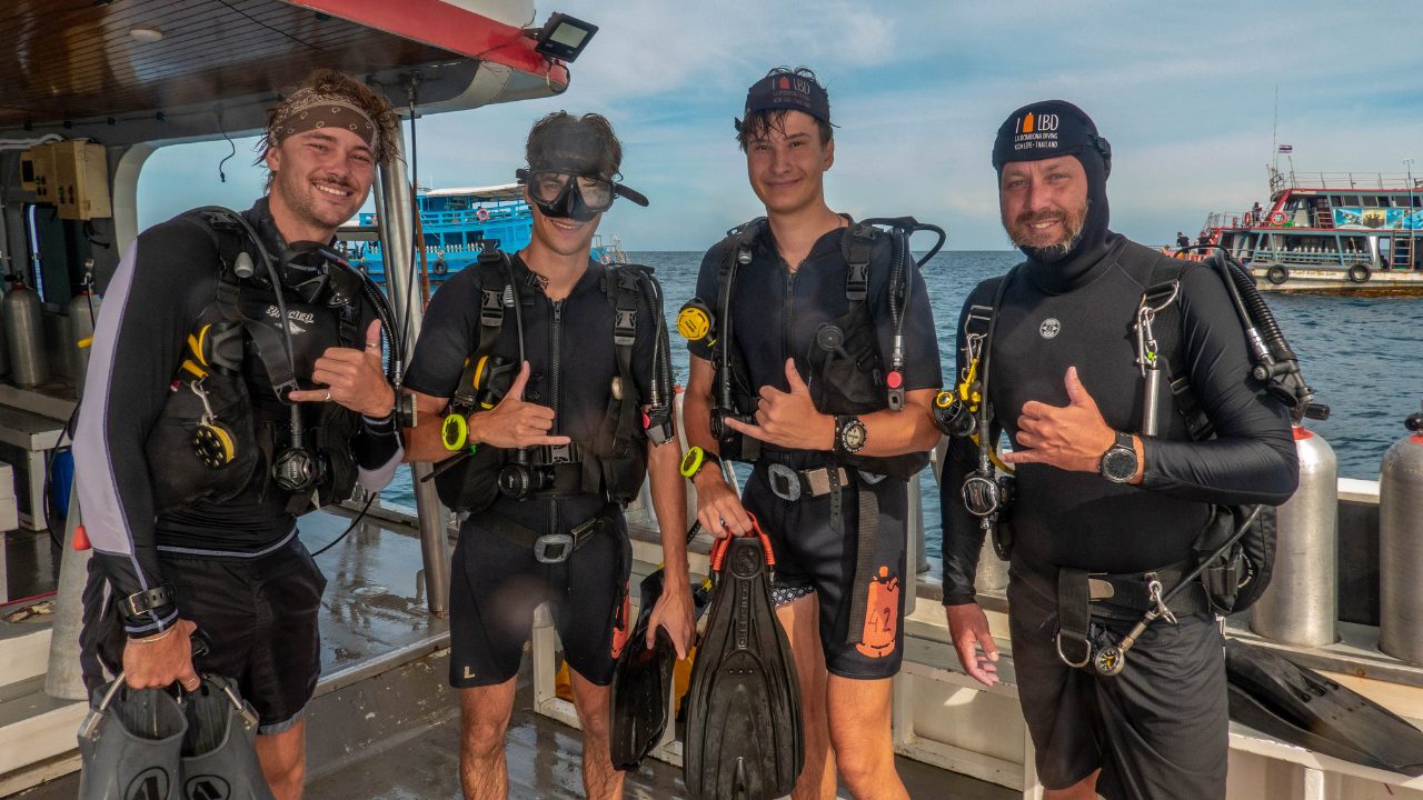 Professional divemaster preparing for a dive