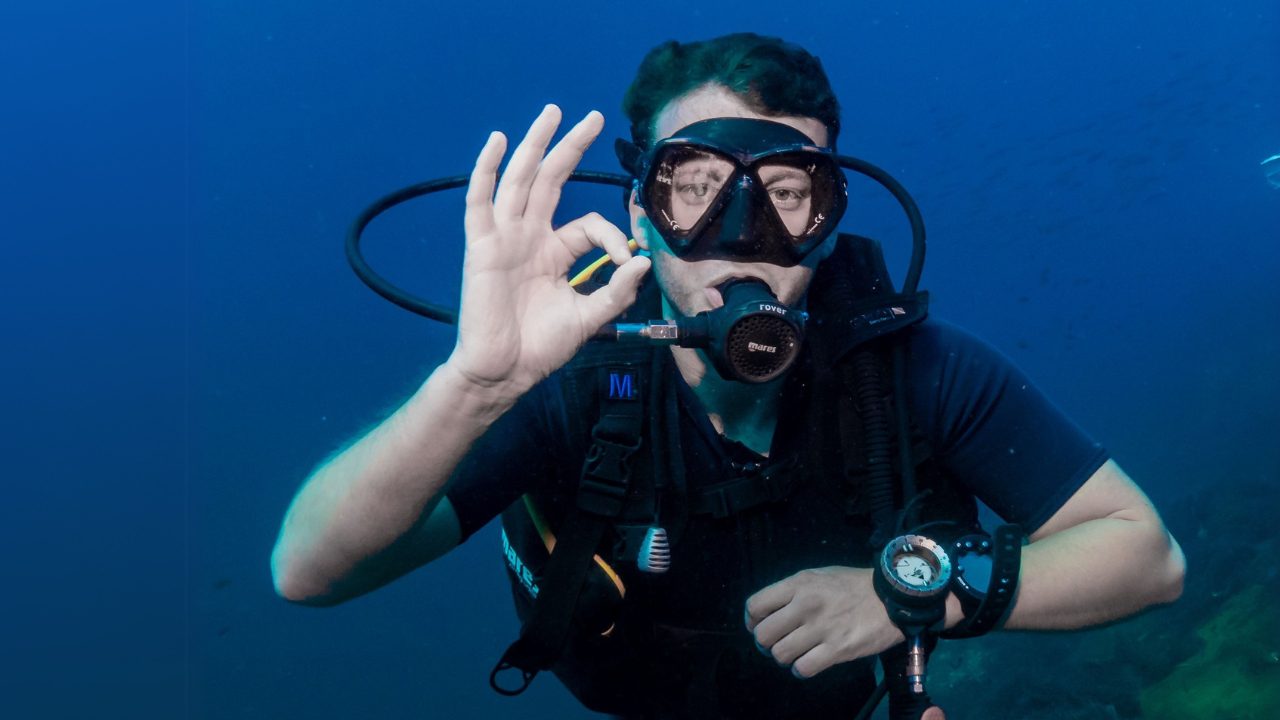Diver making OK signal underwater