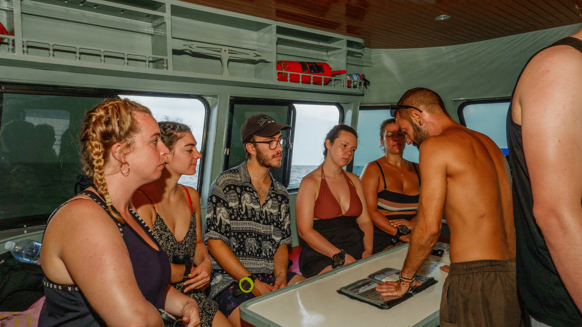 Dive instructor guiding students