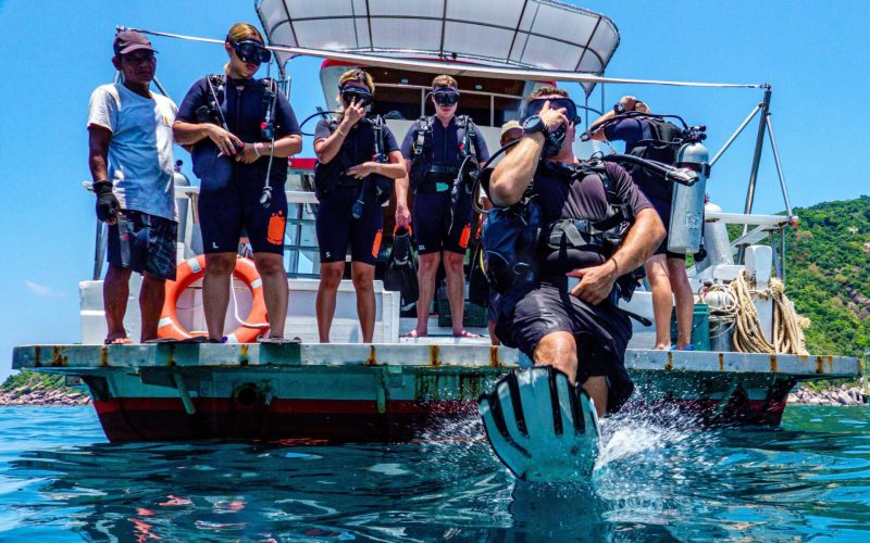 divers entering water